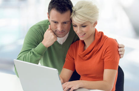 couple-looking-at-a-laptop2_460x300